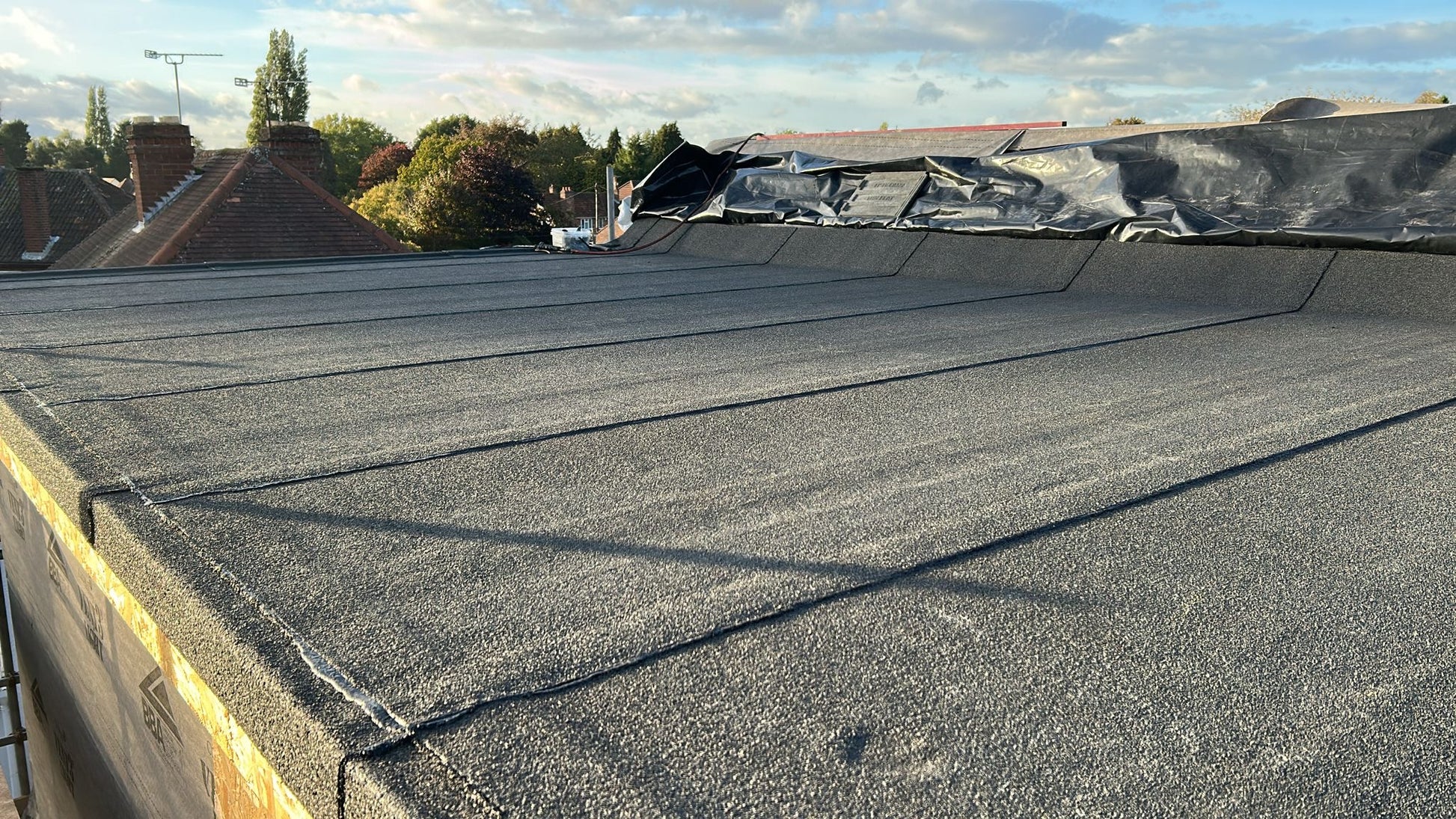 Roof with a newly installed waterproofing system