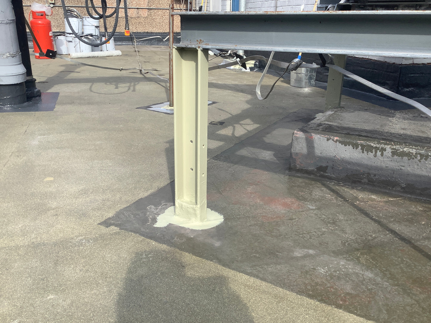 Vanquish 2K Metal Primer applied to structural steel support prior to liquid waterproofing installation