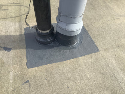 polyurethane roof coating applied to flat roof waterproofing system