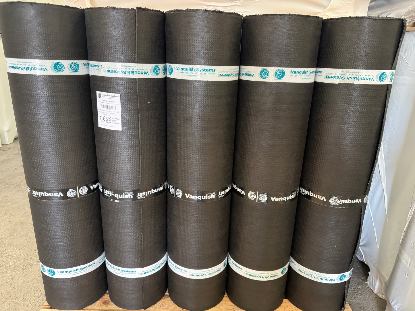Pallet of Vanquish trade roofing felt underlay rolls ready for dispatch