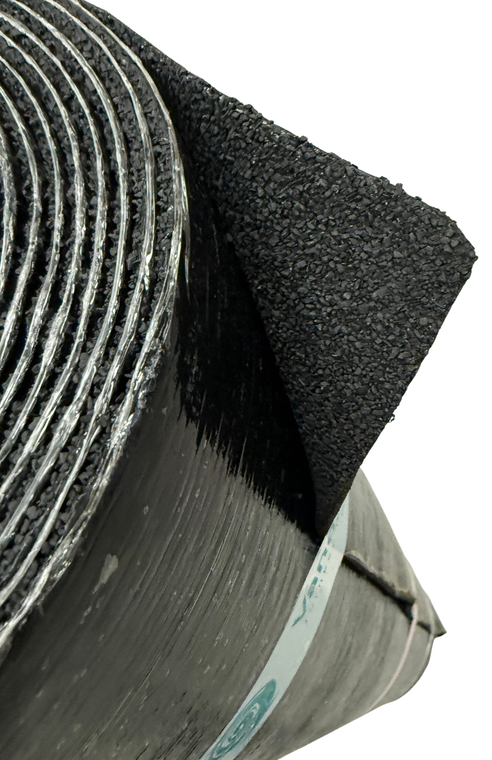 Detail view of Vanquish Pro SBS-modified torch-on roofing felt showing the mineral-finished upper surface and reinforced roofing membrane construction.