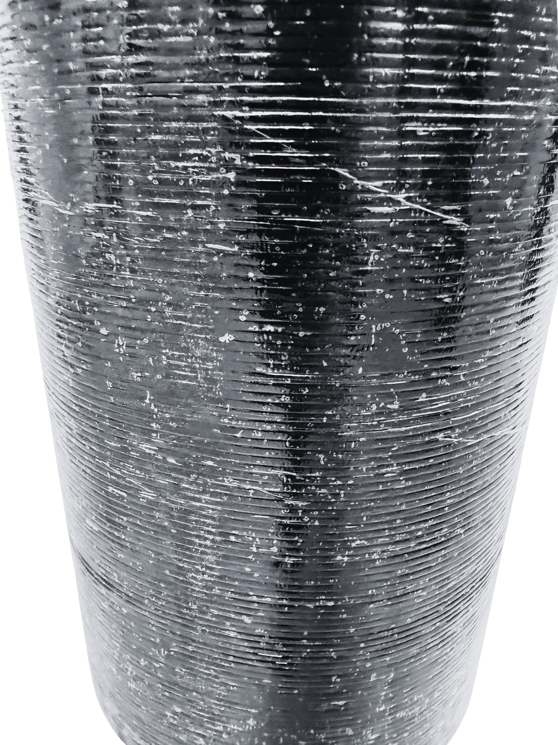 Grooved thermofusible underside film of Vanquish Pro SBS roofing felt designed to promote strong adhesion and efficient torch application during installation.